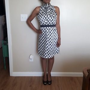 Abstract polka dots  tie neck dress.